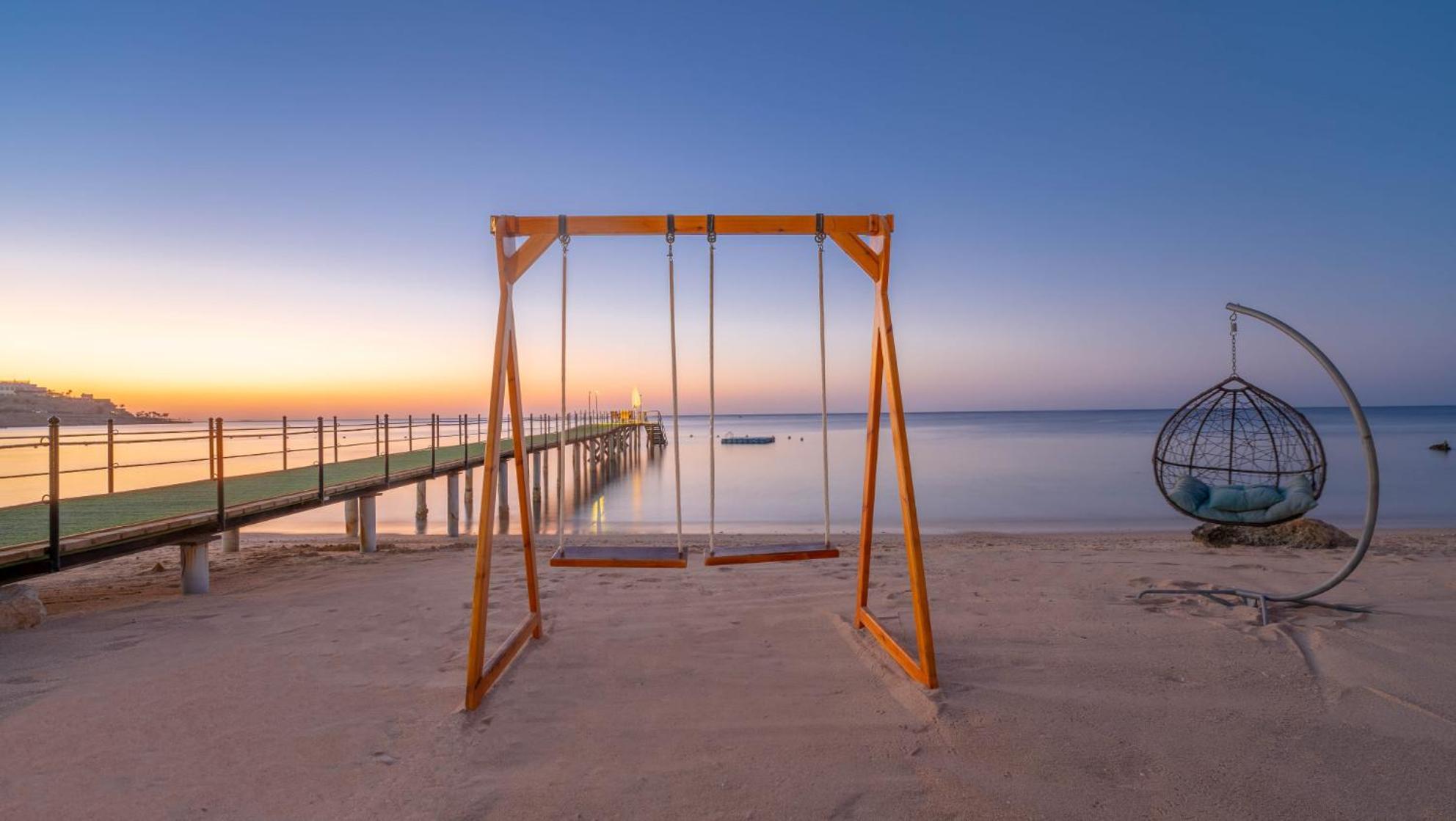 Park Regency Sharm El Sheikh Resort Esterno foto Sunset at the beach